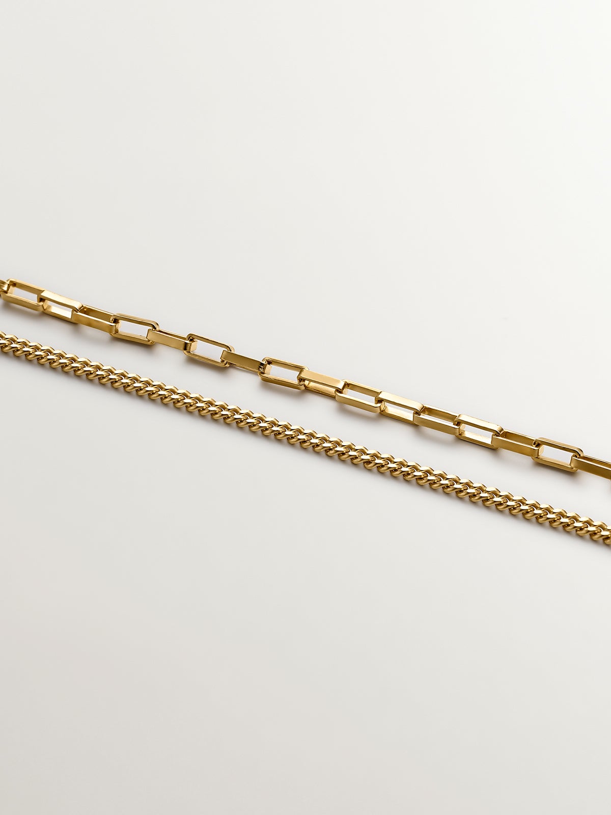 Two-tone pendant in 925 silver and 925 silver plated in 18K yellow gold with geometric shapes