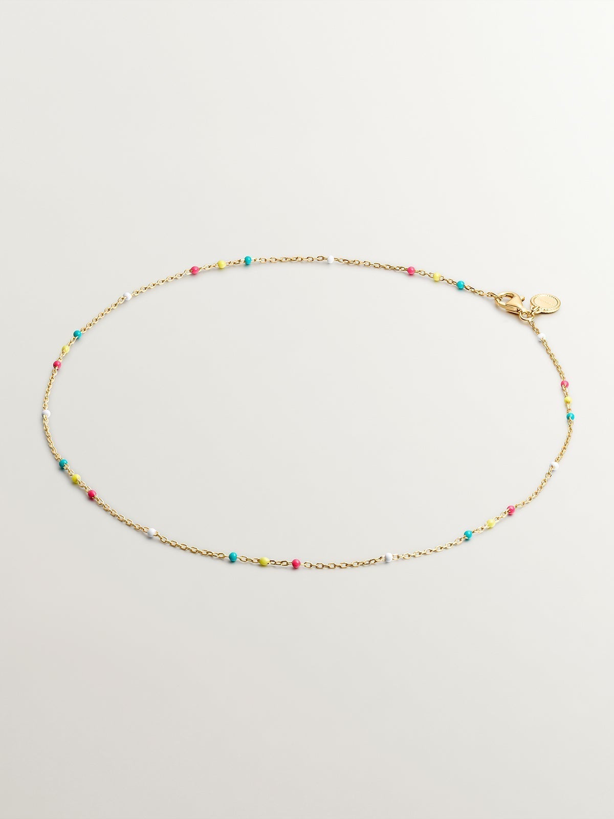 925 Silver chain dipped in 18K yellow gold with multicolor enamel.