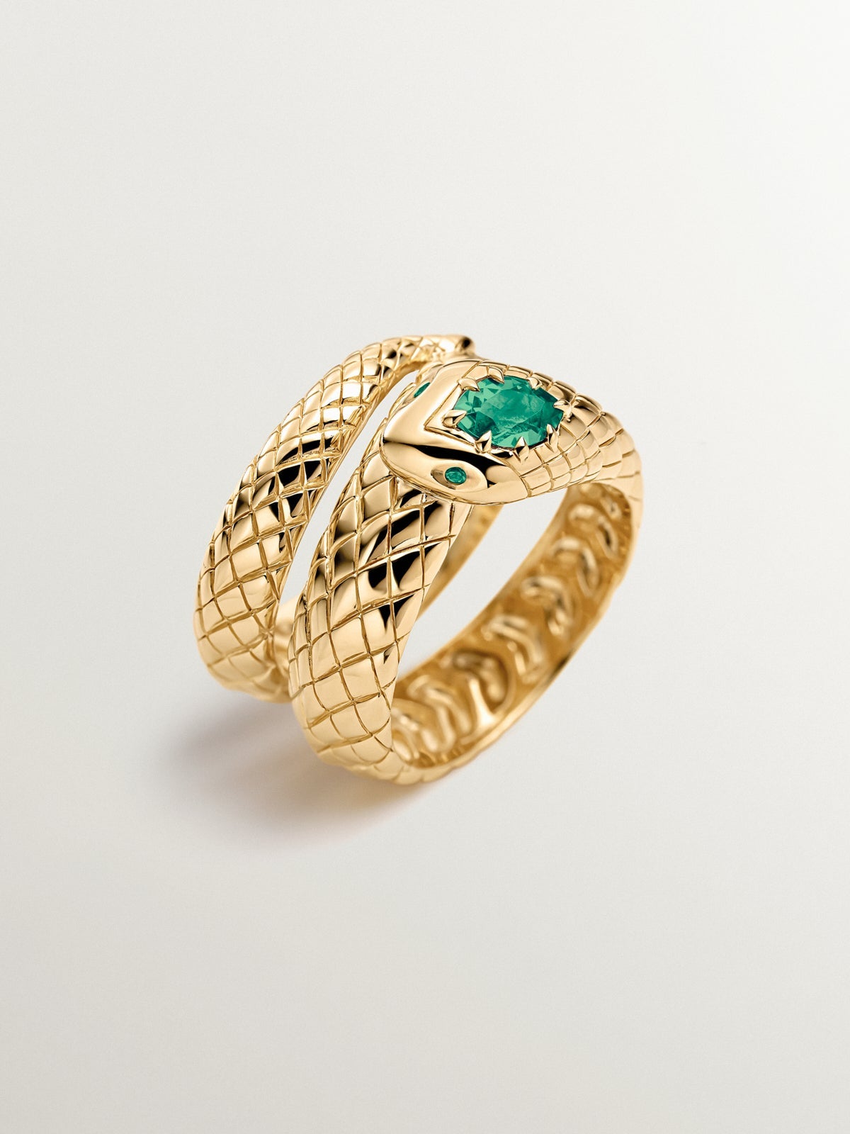 925 silver ring plated in 18K yellow gold with green onyx and in the shape of a snake