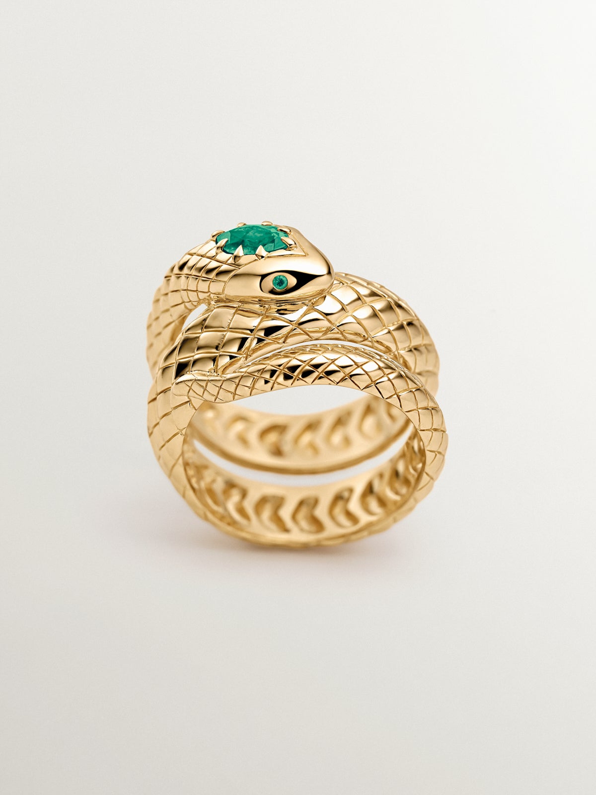 925 silver ring plated in 18K yellow gold with green onyx and in the shape of a snake