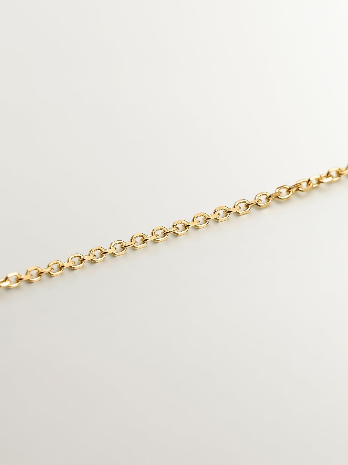 18K yellow gold pendant with three diamonds