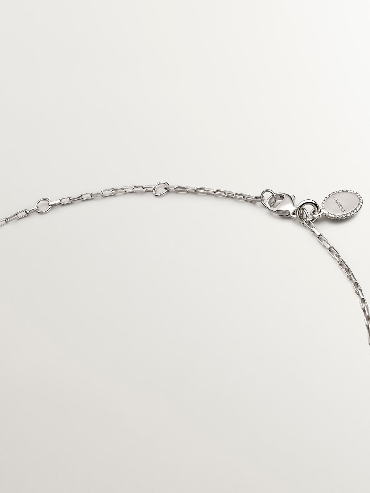 925 Silver pendant with circle of white topazes.