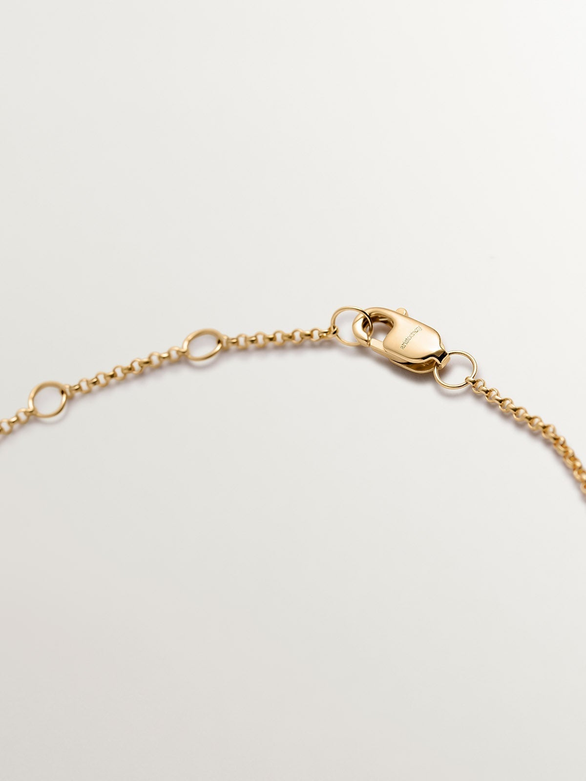 9K Yellow Gold bracelet with interlaced hearts