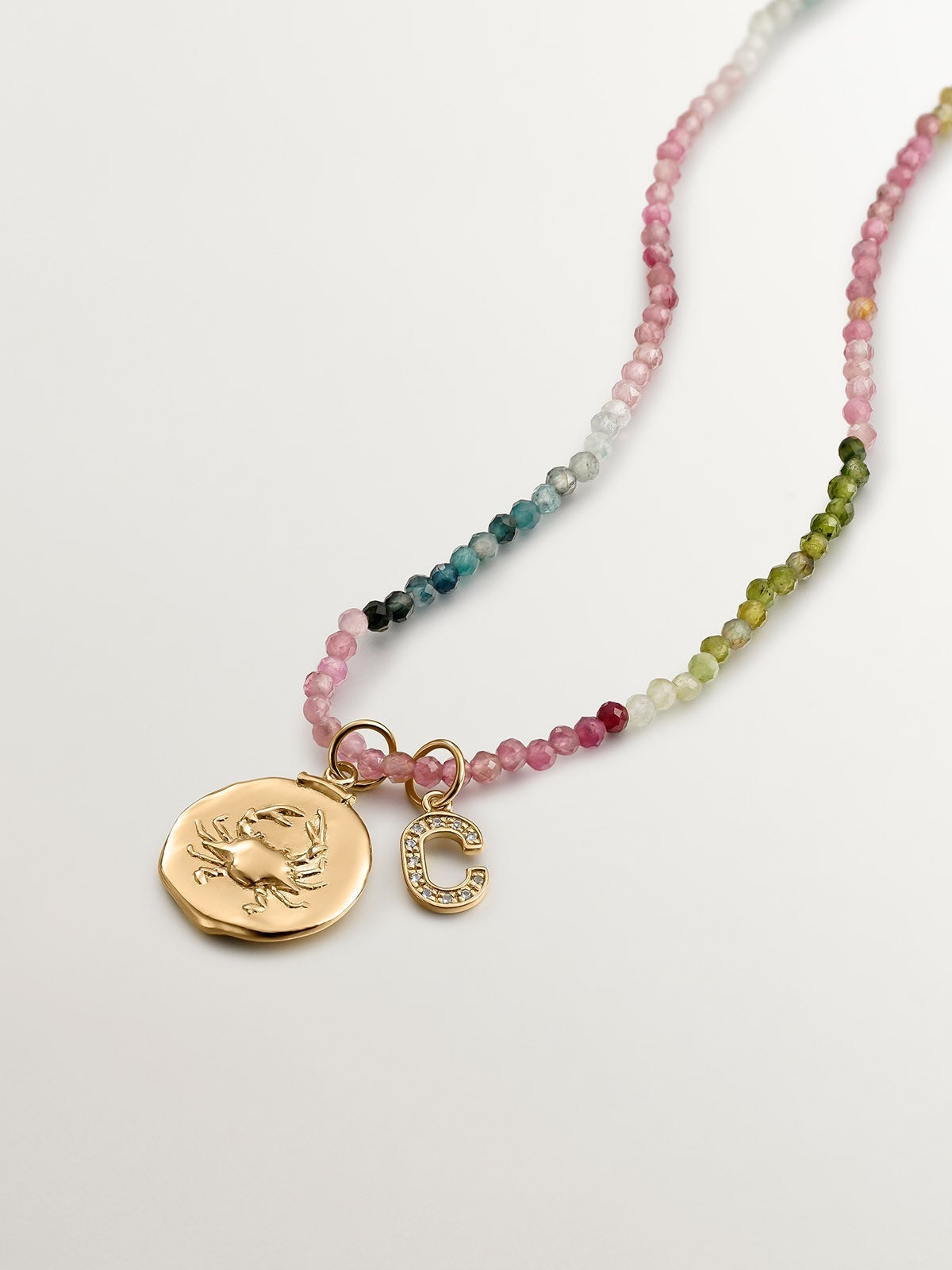 925 Silver Charm plated in 18K Yellow Gold with white topaz, initial C.