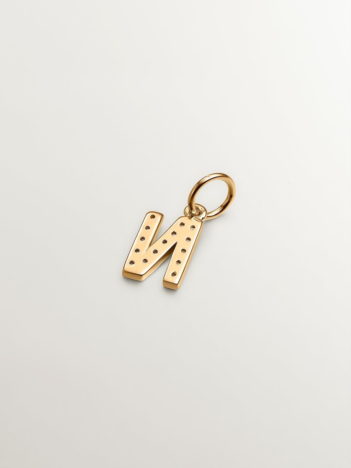 925 Silver charm bathed in 18K yellow gold and white topaz initial N