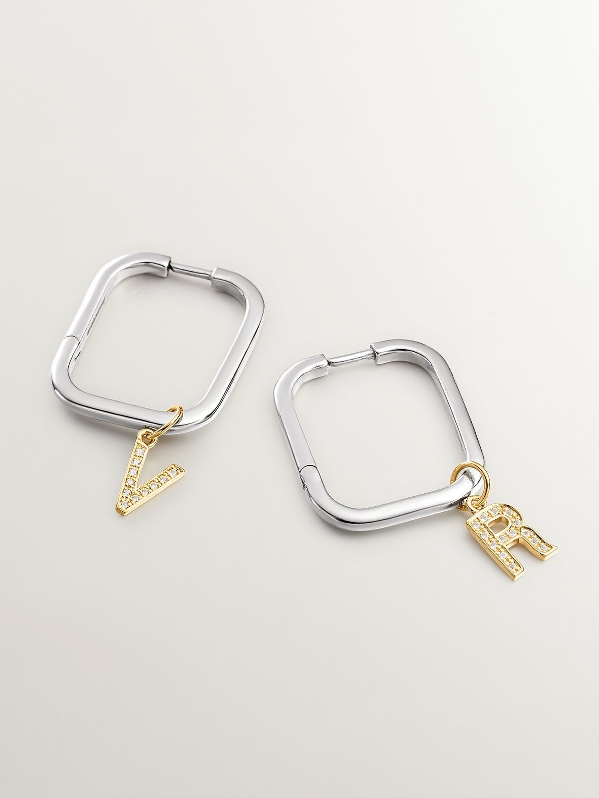 925 Silver charm bathed in 18K yellow gold with white topazes initial R