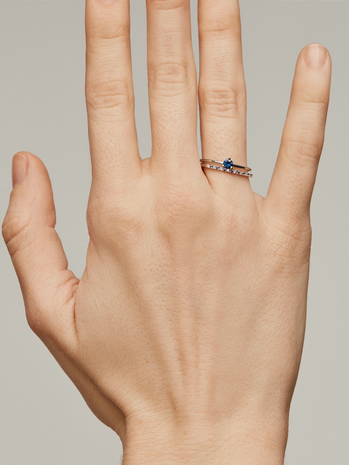 9K white gold ring with sapphires and diamonds