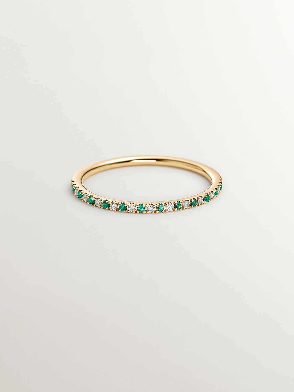 18K yellow gold ring with emeralds and diamonds