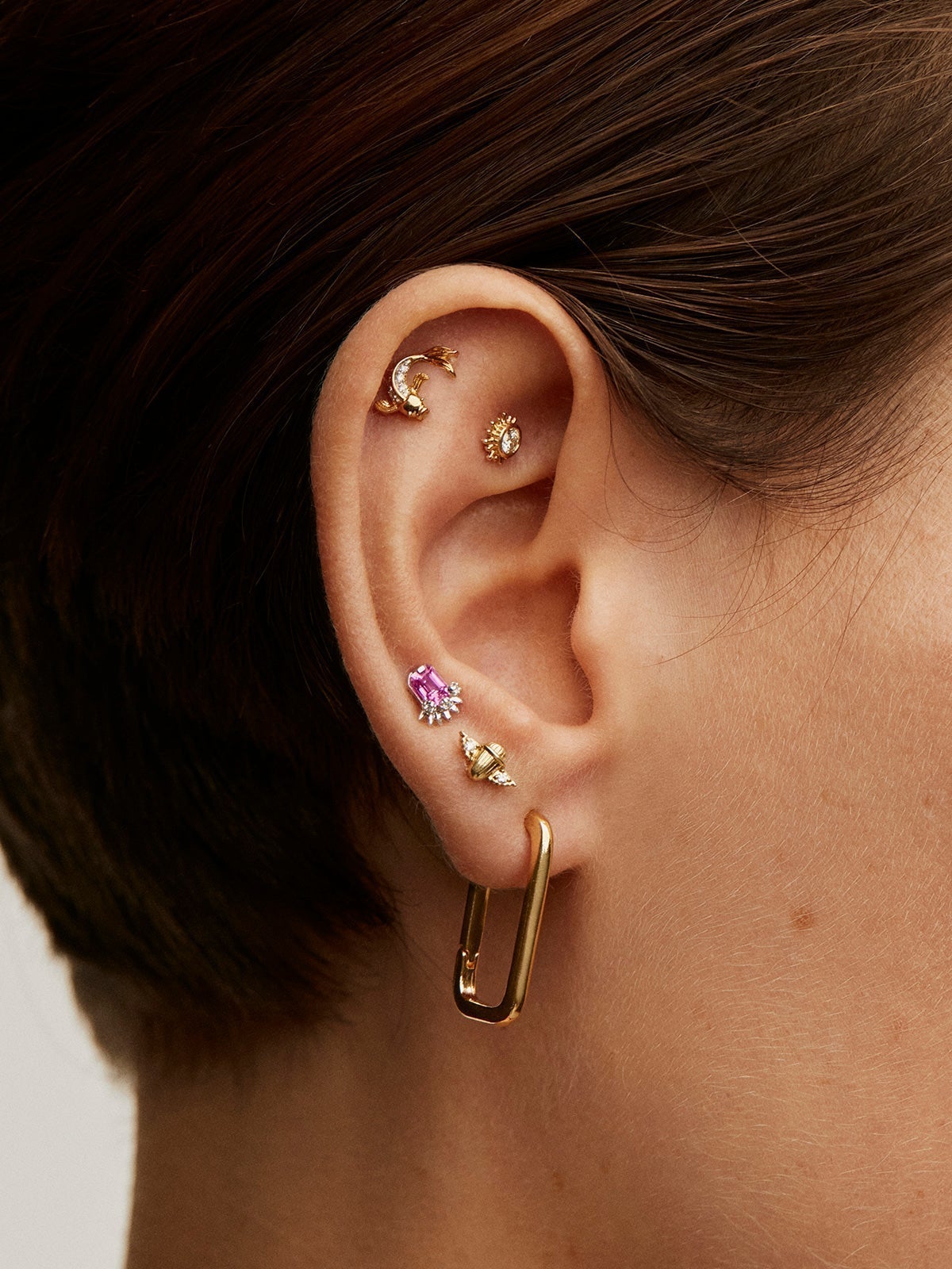 18K yellow gold piercing with diamond