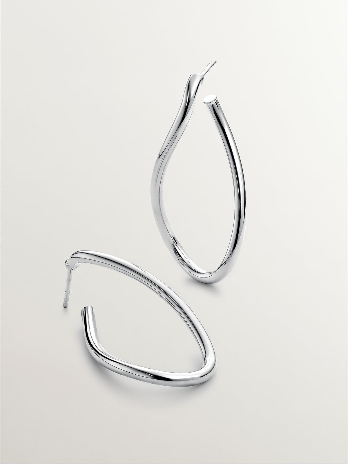 Large wavy hoop earrings made of 925 silver