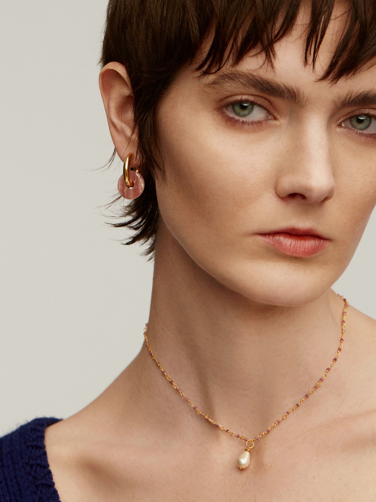 18K yellow gold-plated 925 silver charm with pearl.
