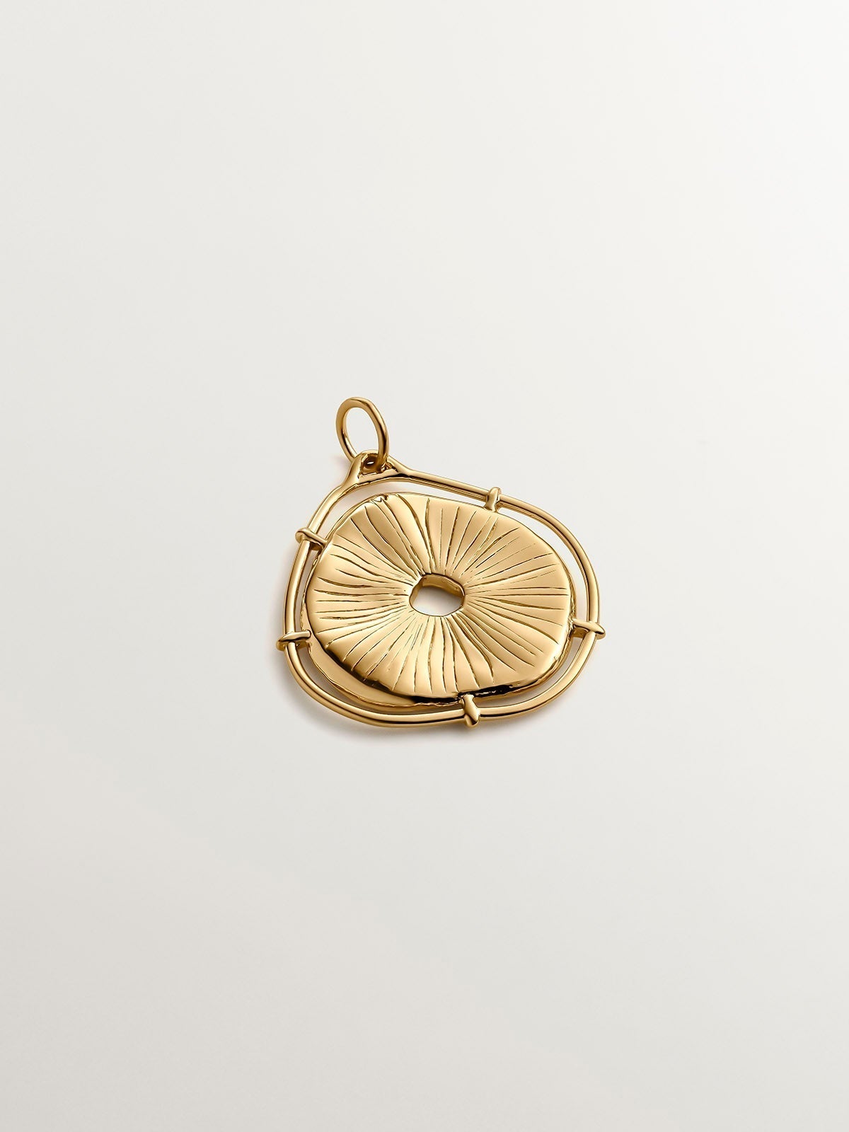 925 Silver charm, gold-plated in 18K yellow gold, with an irregular medallion shape and white topaz stones.