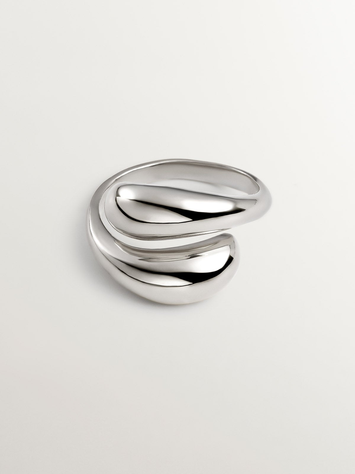 You and Me ring made of 925 silver with a domed spiral shape.