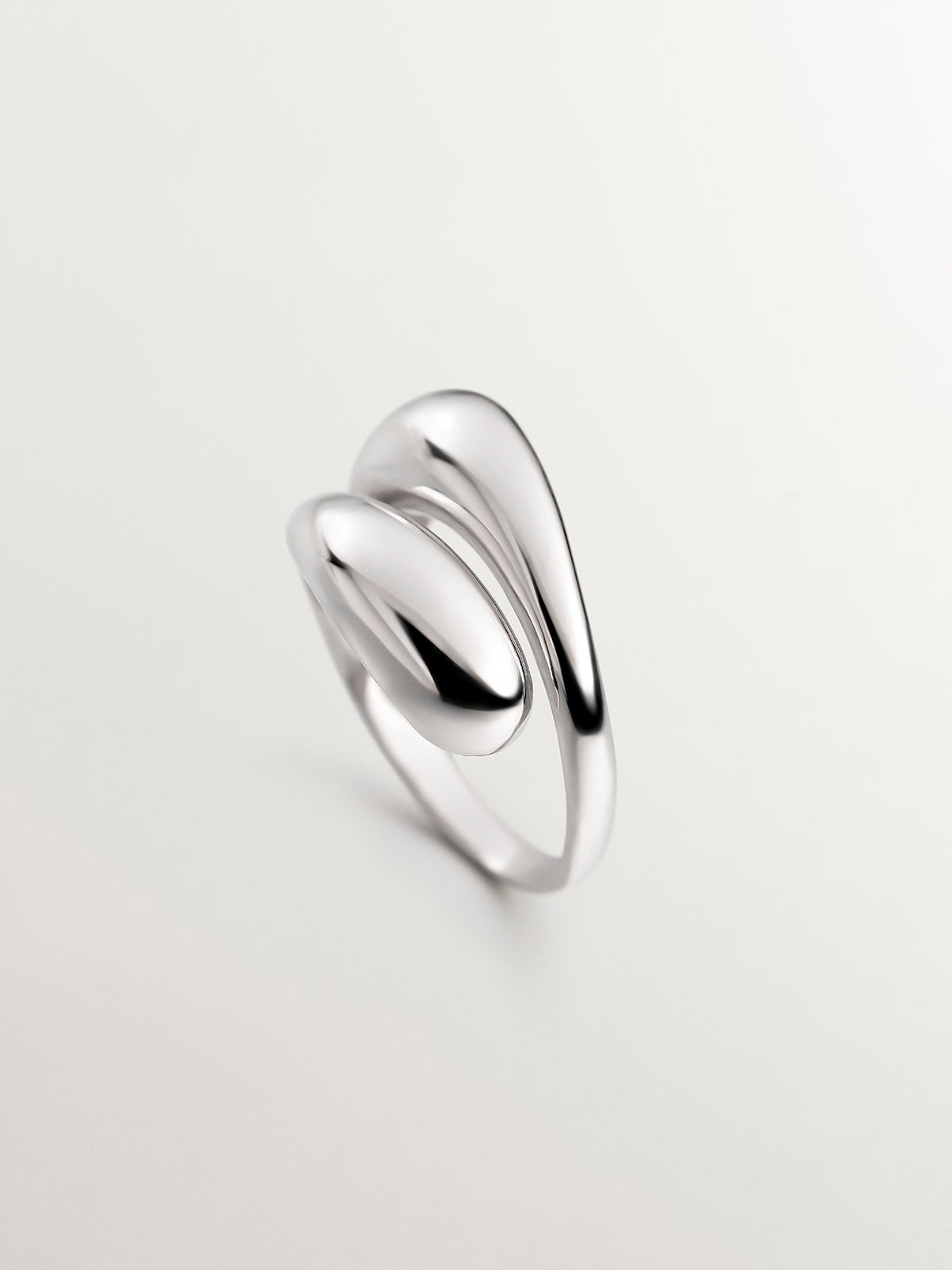 You and Me ring made of 925 silver with a domed spiral shape.