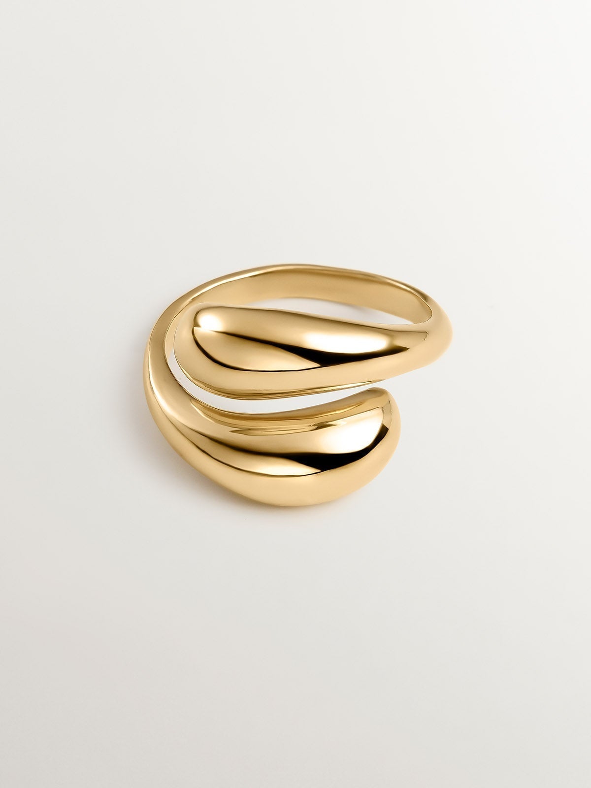 You and Me ring made of 925 silver, bathed in 18K yellow gold with a domed spiral shape.
