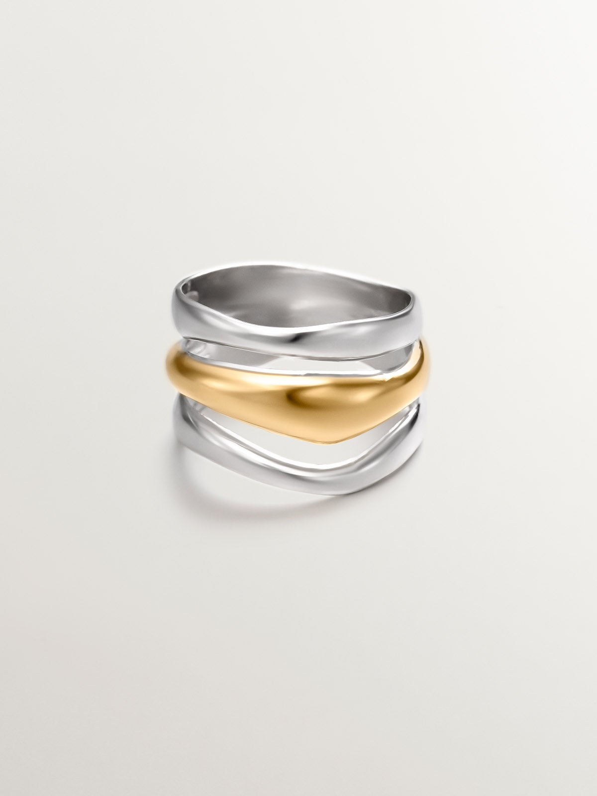 Bicolor triple ring made of 925 silver and 925 silver bathed in 18K yellow gold.