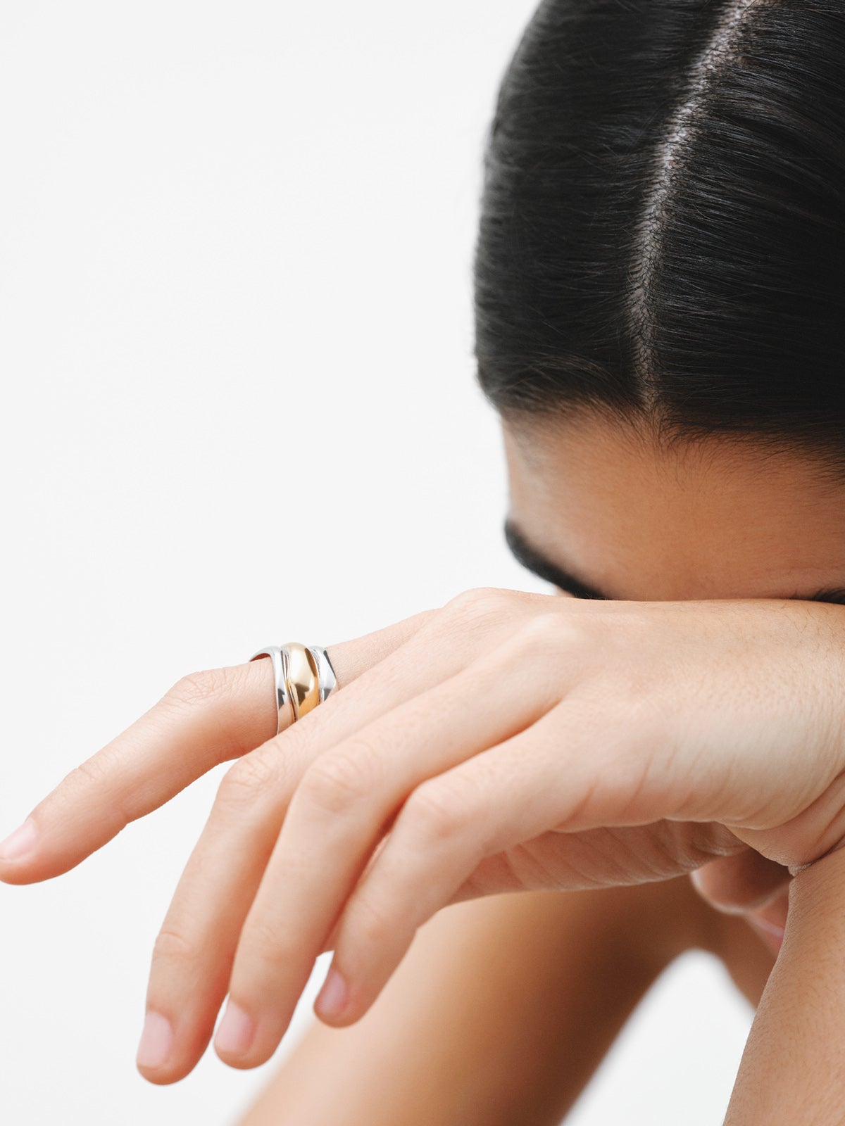 Bicolor triple ring made of 925 silver and 925 silver bathed in 18K yellow gold.