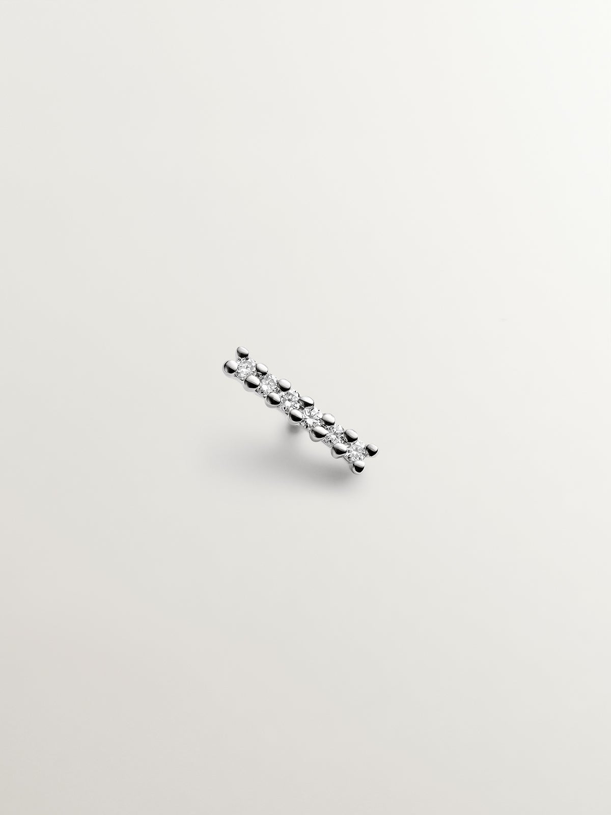 18K white gold solitaire piercing with 0.02 ct brilliant cut diamonds