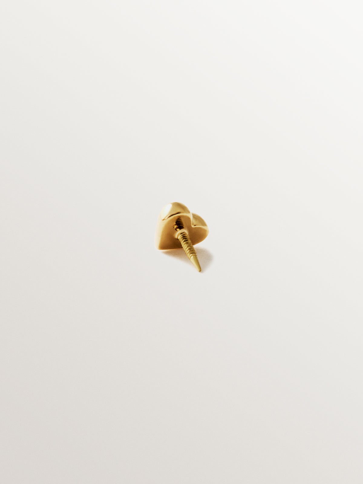 18K yellow gold heart-shaped piercing