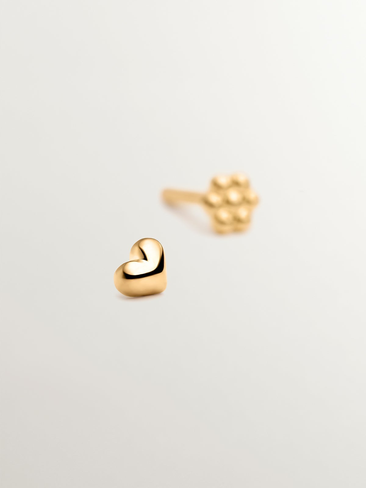18K yellow gold heart-shaped piercing