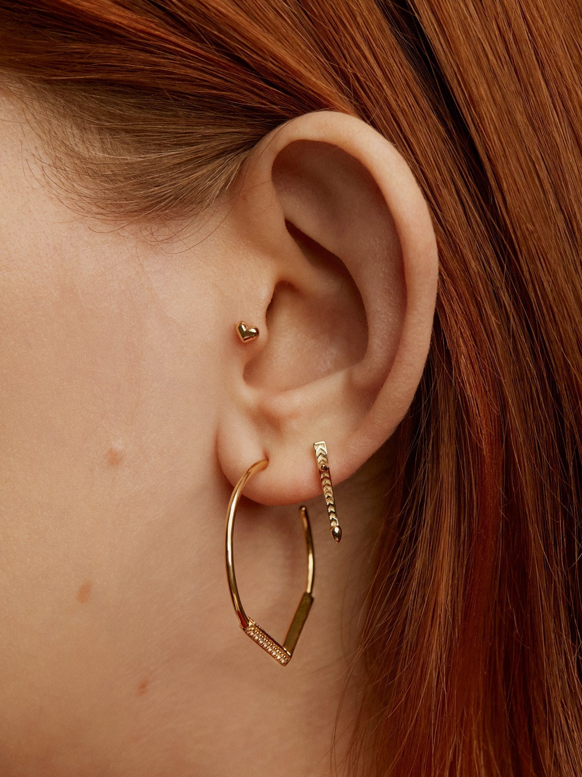 18K yellow gold heart-shaped piercing
