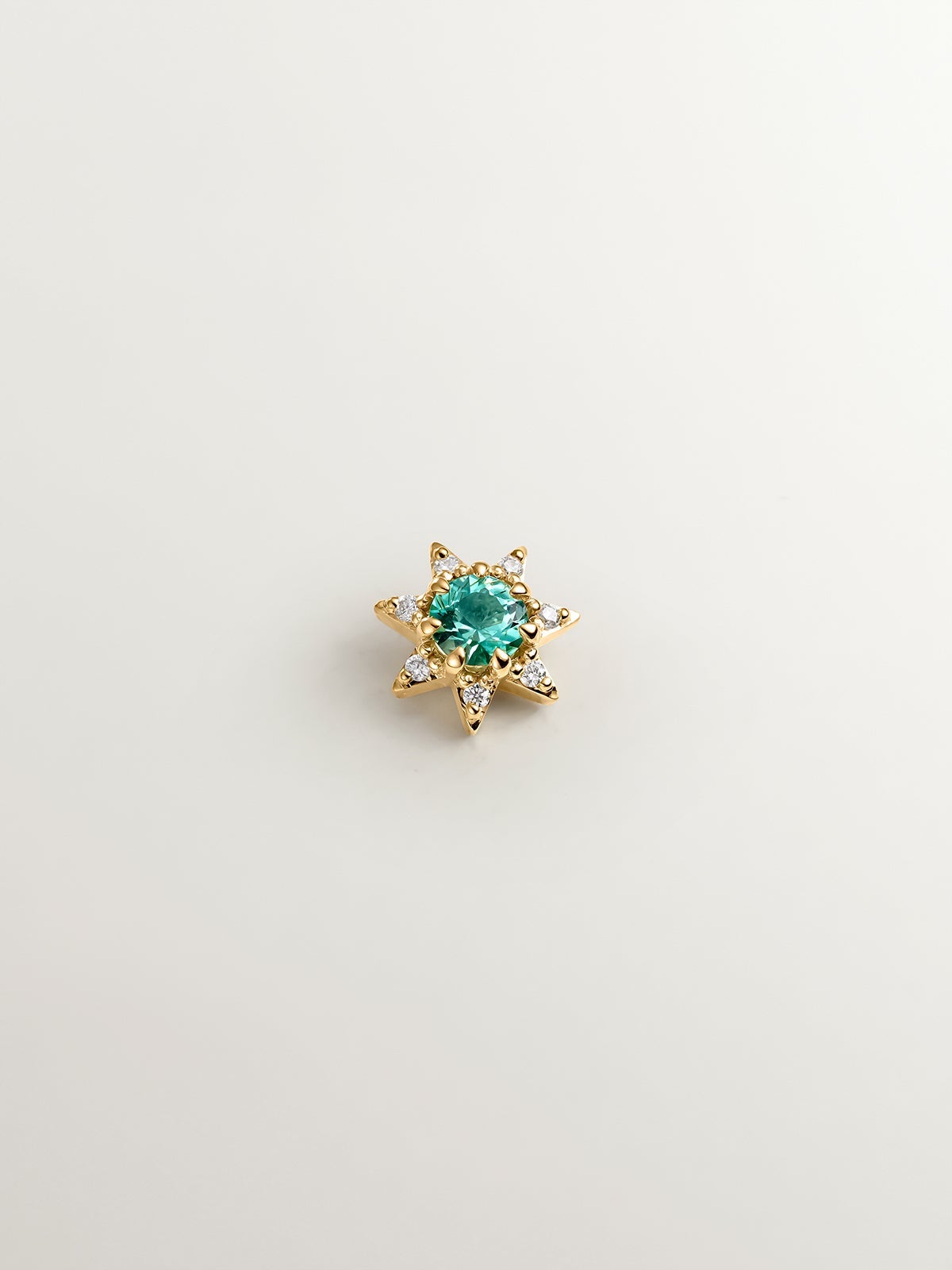 18K yellow gold piercing with emerald and diamonds