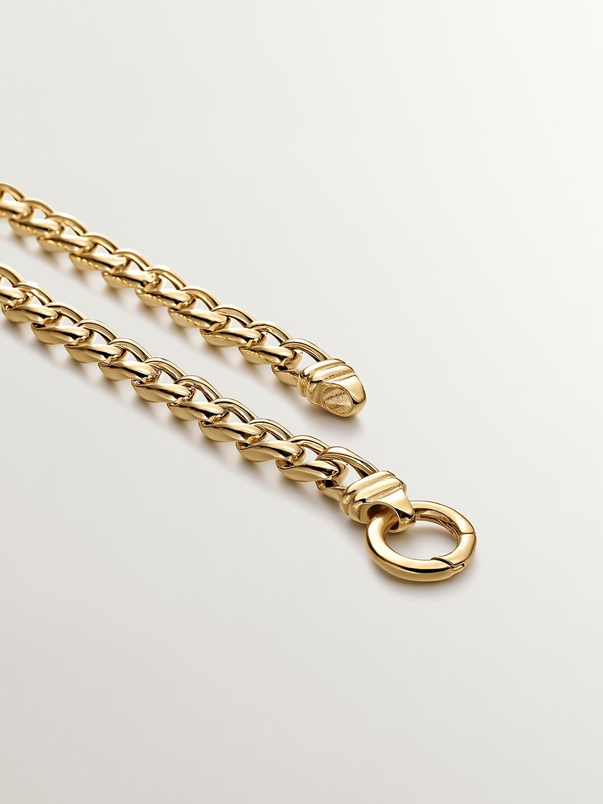 Round 925 silver carabiner coated in 18K yellow gold.