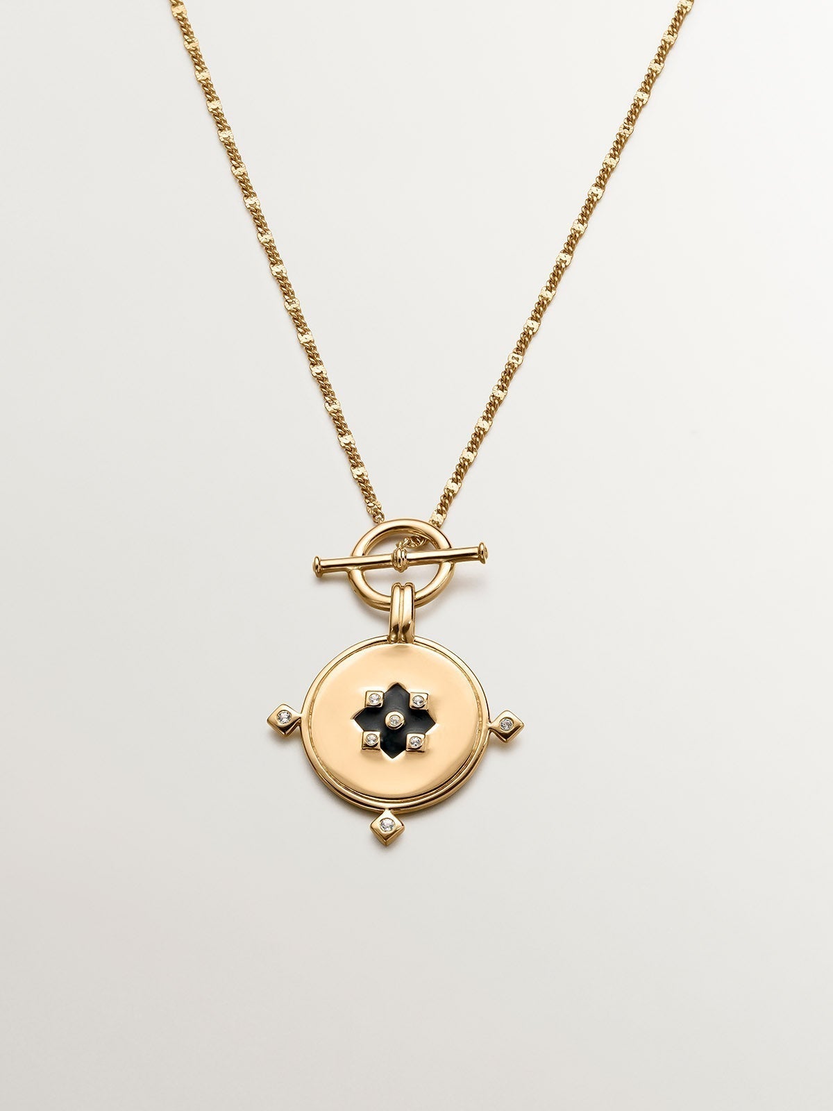 18K yellow gold plated 925 sterling silver pendant with medal, white topaz and black enamel