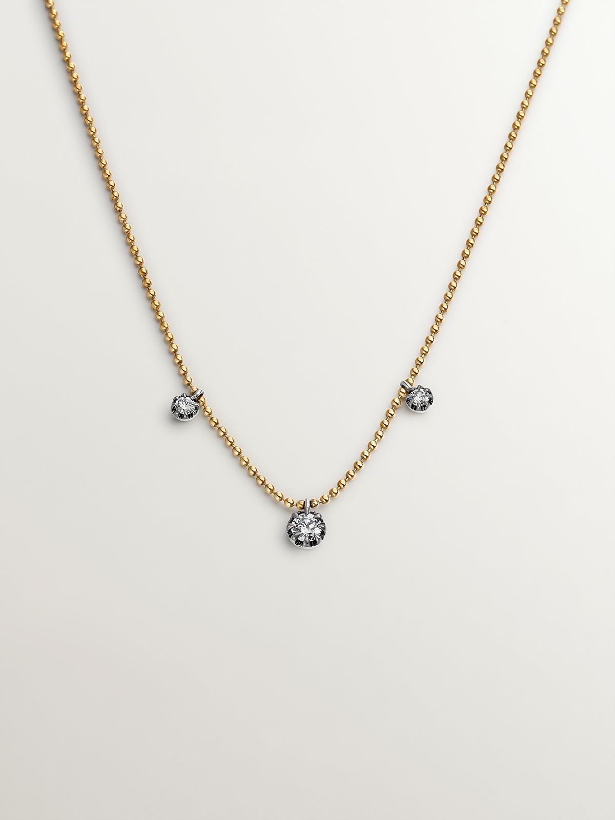 18K yellow gold necklace with aged effect and brilliant-cut diamonds