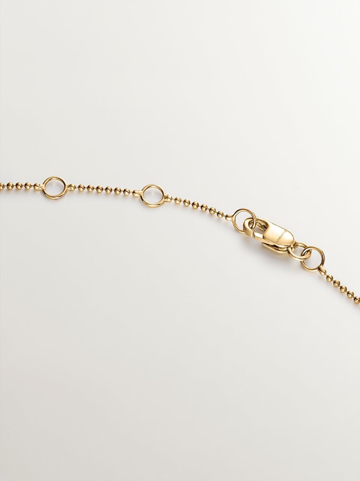 18K yellow gold necklace with aged effect and brilliant-cut diamonds