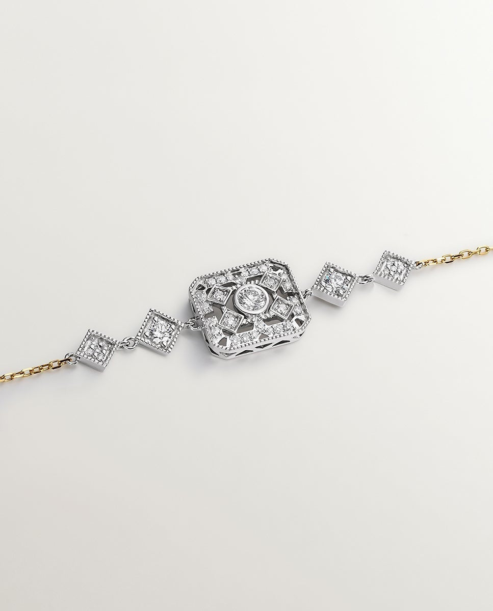 18K white and yellow gold bracelet with brilliant cut diamonds