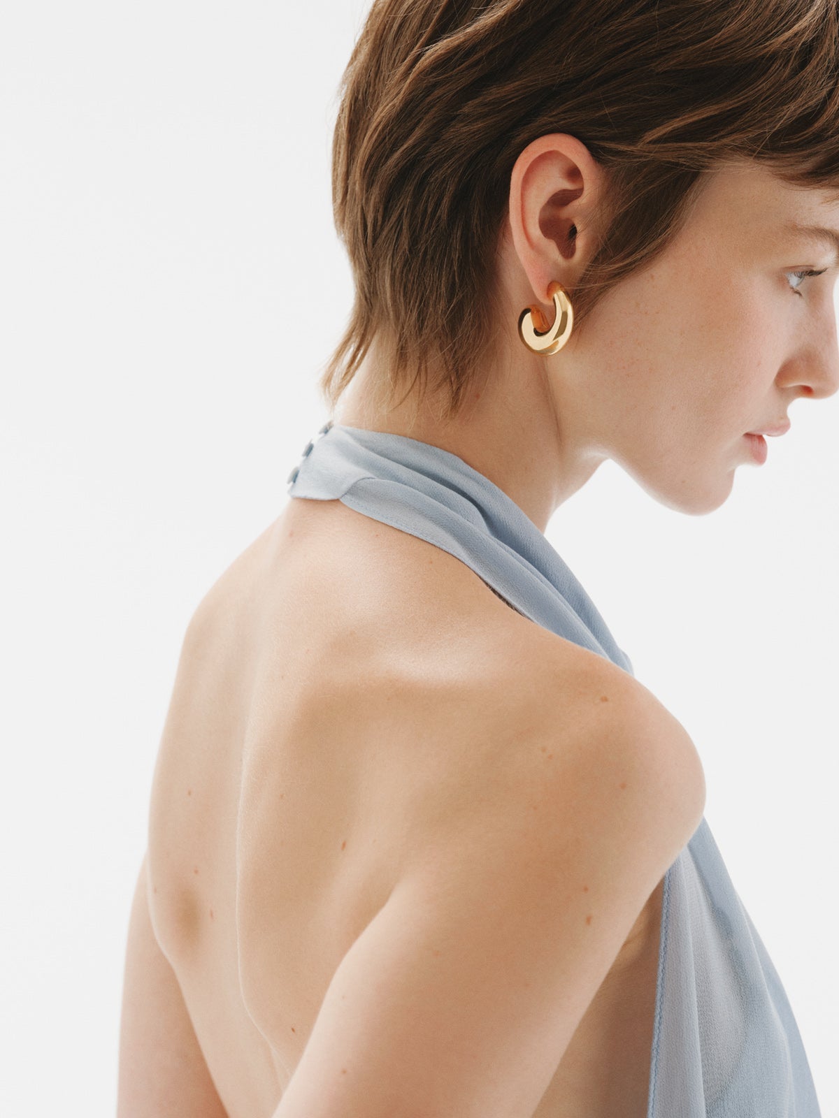 Large chunky hoop earrings made of 18K gold-plated 925 silver