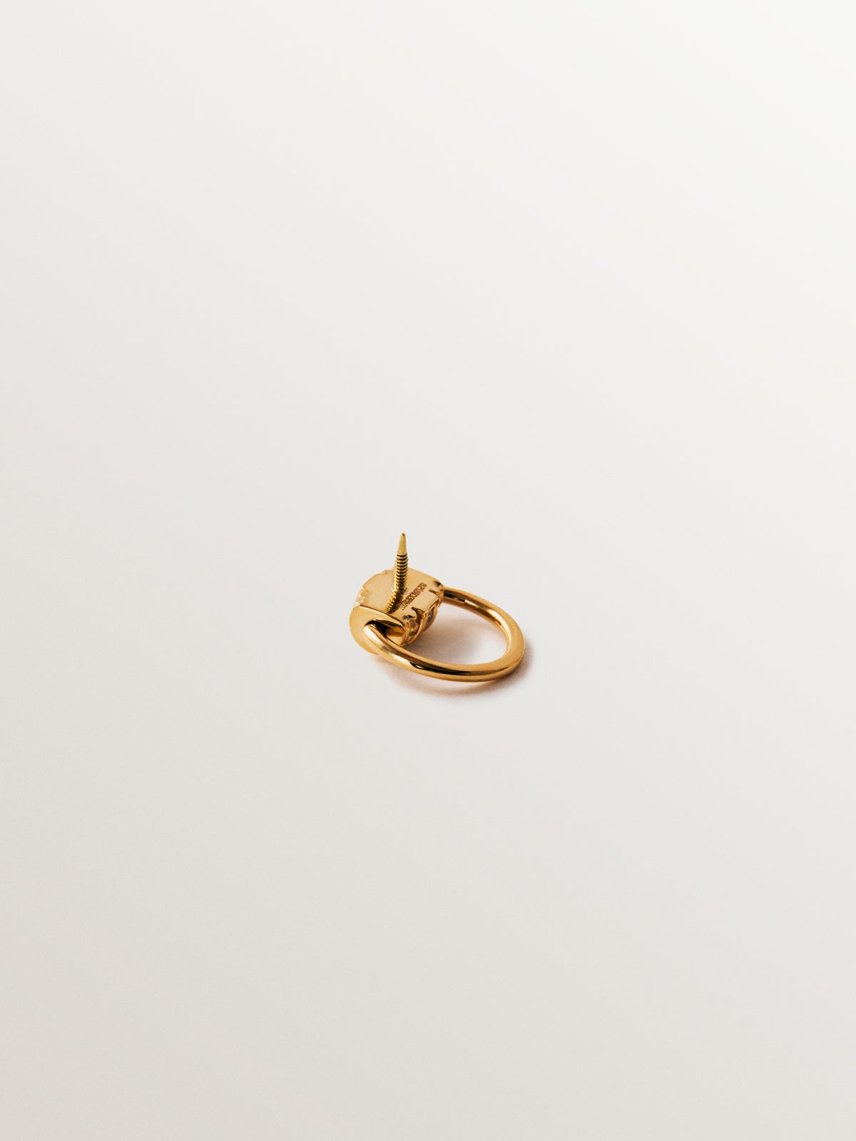 18K yellow gold single hoop piercing with pavé diamonds