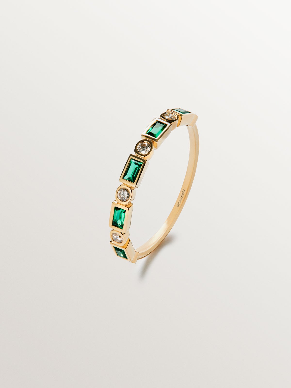 9K yellow gold ring with green emeralds and diamonds