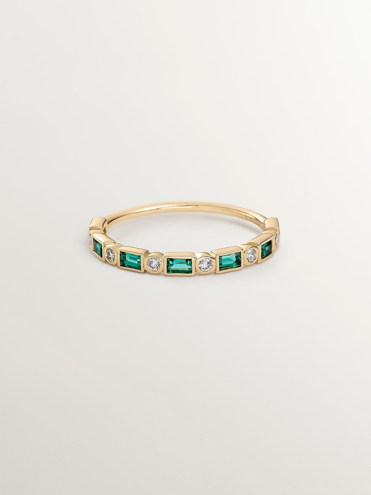 9K yellow gold ring with green emeralds and diamonds