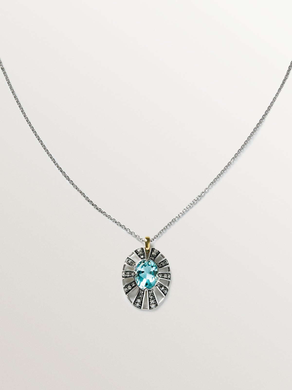 9K White and Yellow Gold Pendant with Blue Topaz and Diamonds