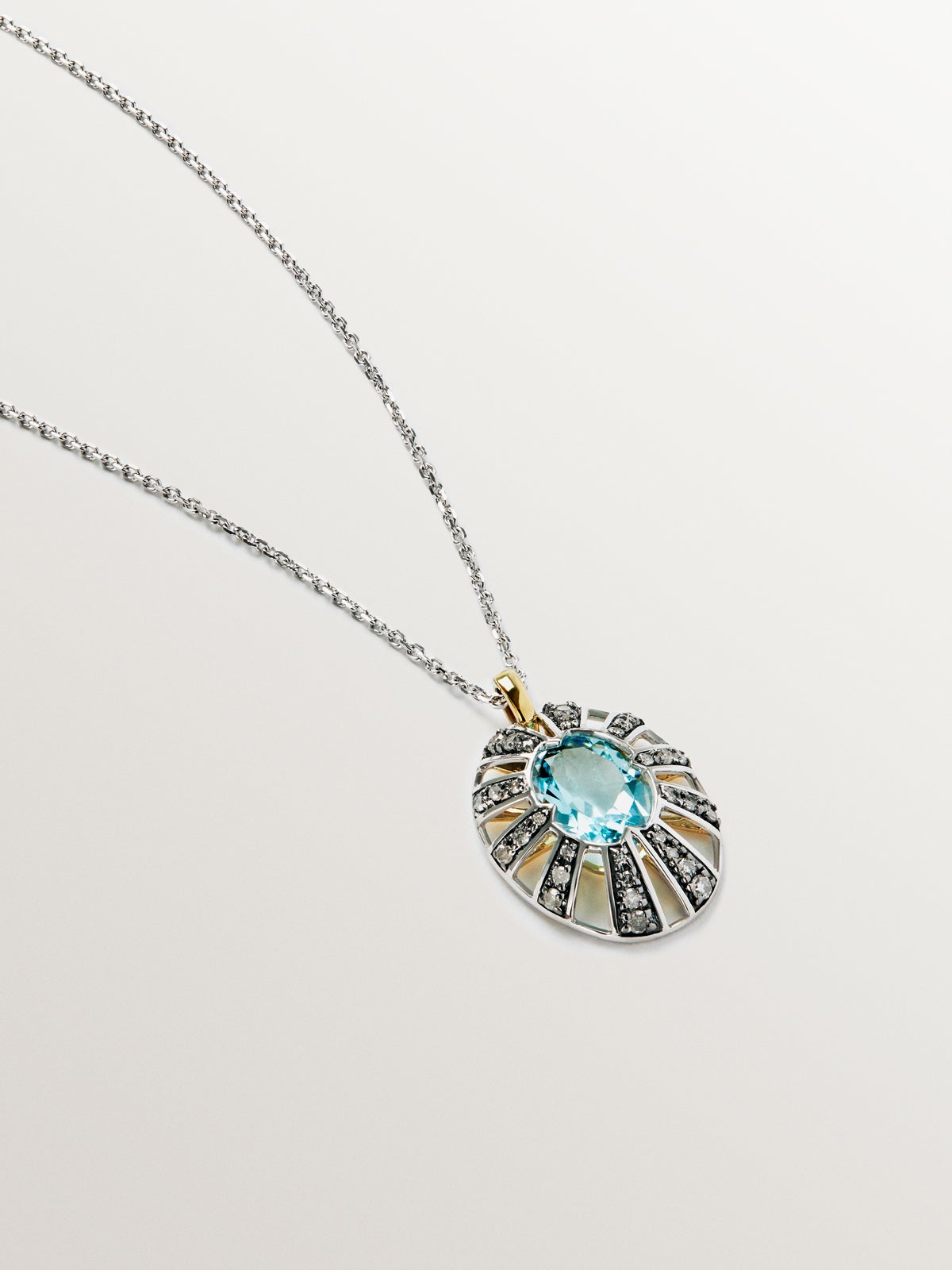 9K White and Yellow Gold Pendant with Blue Topaz and Diamonds