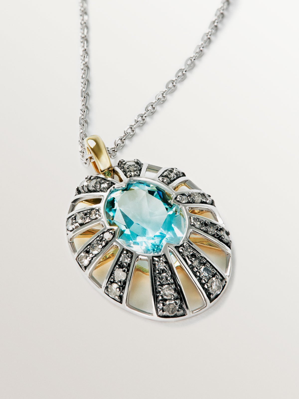 9K White and Yellow Gold Pendant with Blue Topaz and Diamonds