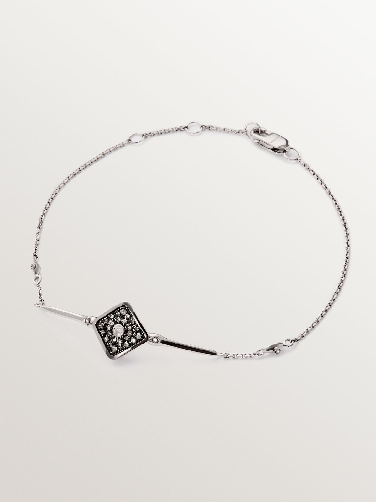 9K white gold bracelet with rhombus shape and diamonds