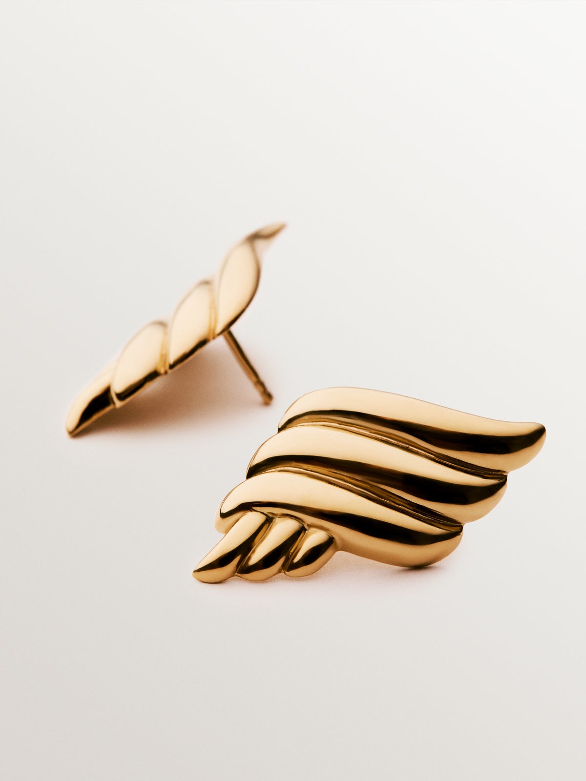 18K yellow gold plated 925 silver earrings with fluid shape