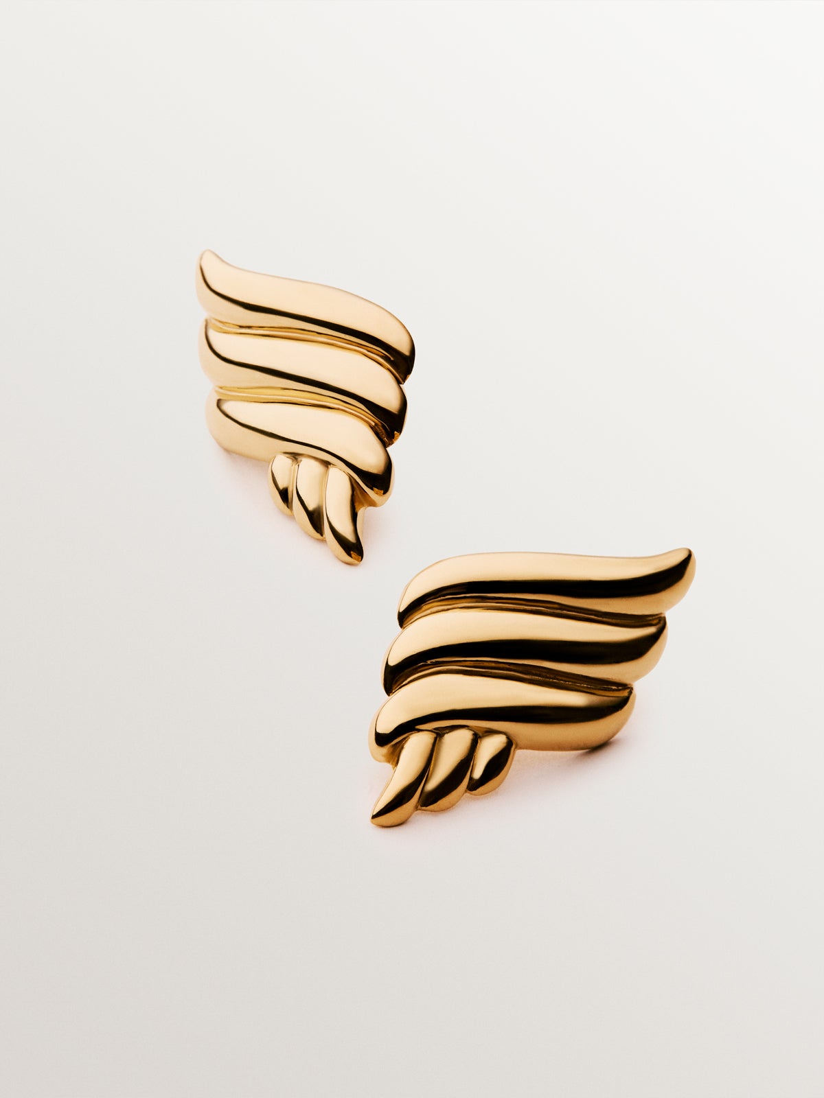 18K yellow gold plated 925 silver earrings with fluid shape