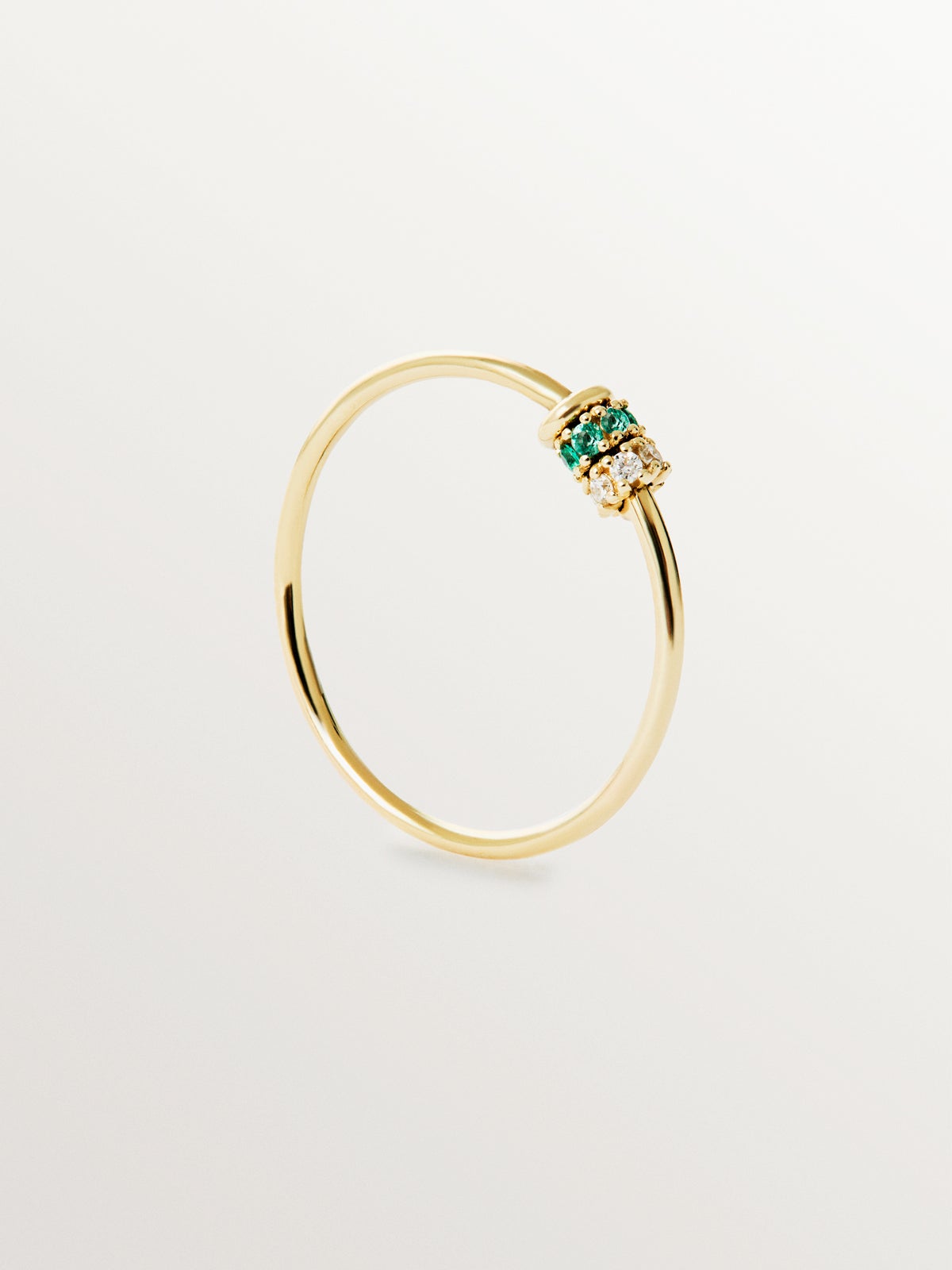 9K yellow gold ring with emeralds and diamonds