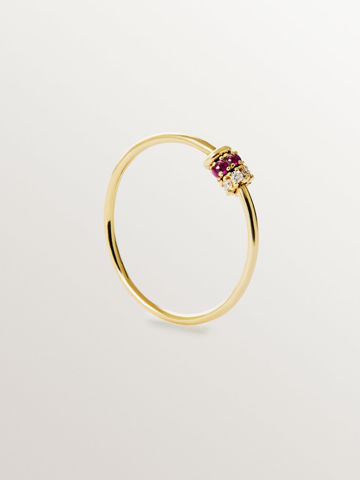 9K yellow gold ring with rubies and diamonds