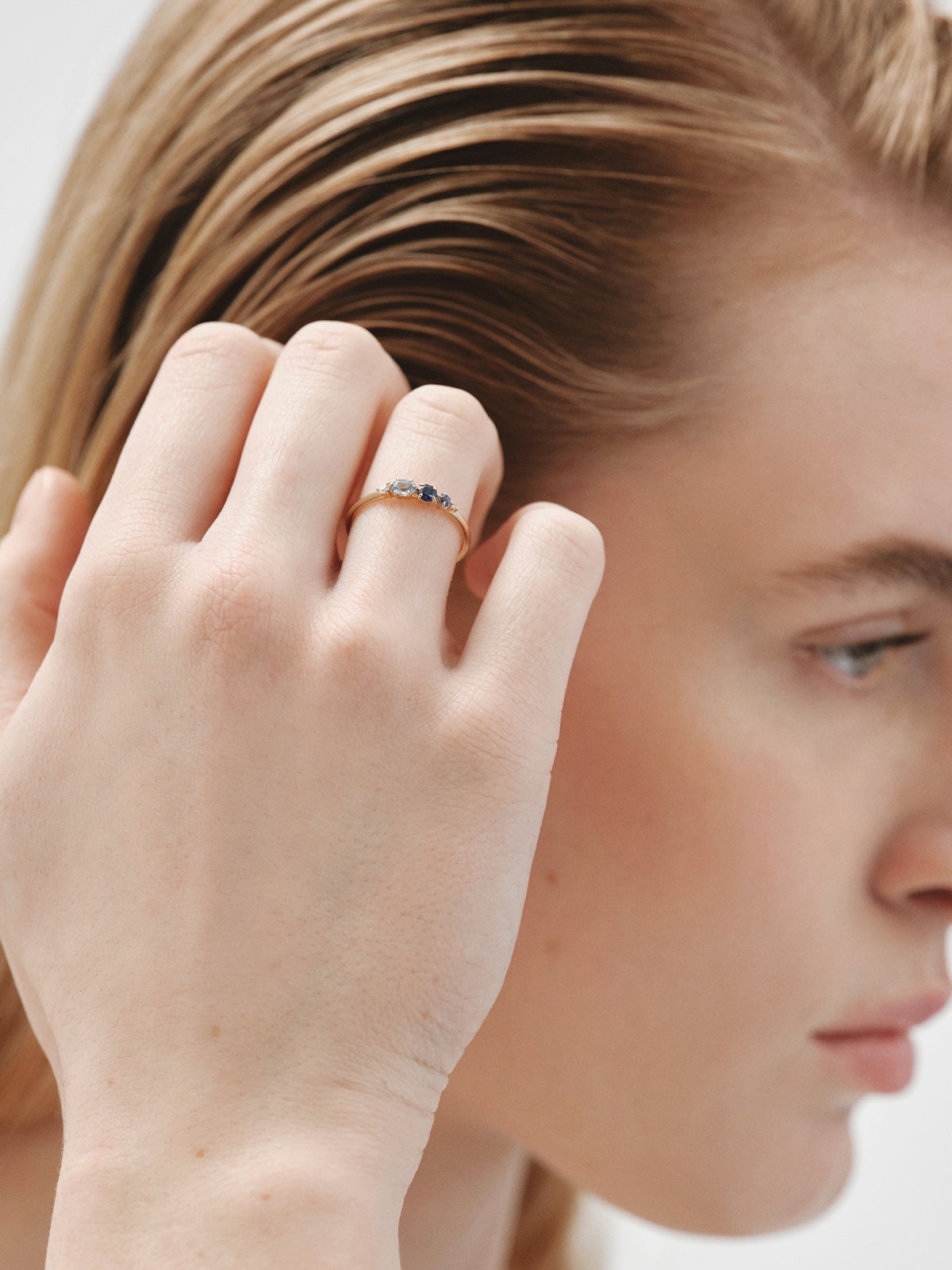 9K yellow gold ring with blue sapphires and diamonds