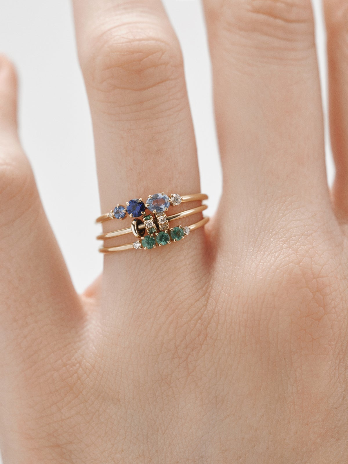 9K yellow gold ring with blue sapphires and diamonds