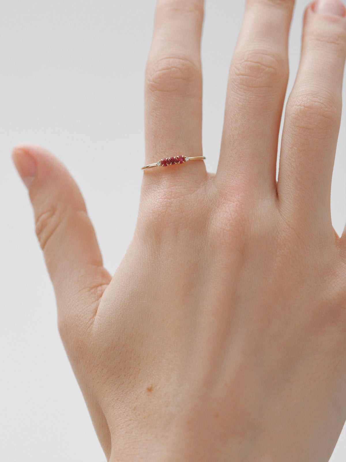 9K yellow gold ring with rubies and diamonds