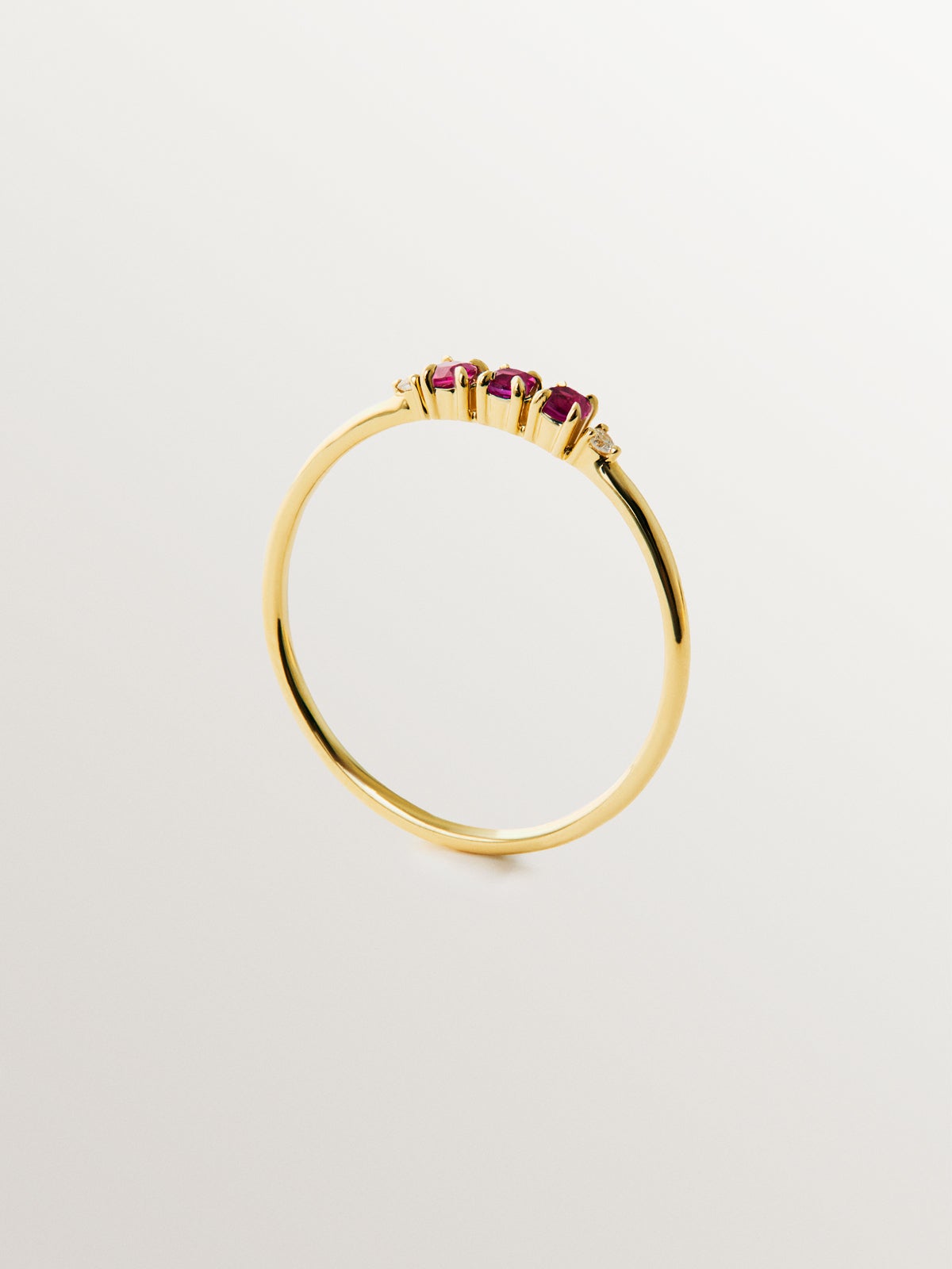 9K yellow gold ring with rubies and diamonds