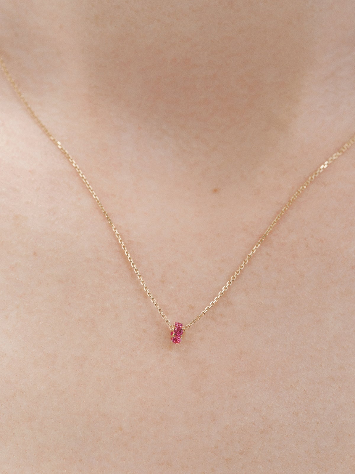 9K yellow gold pendant with rubies and diamonds
