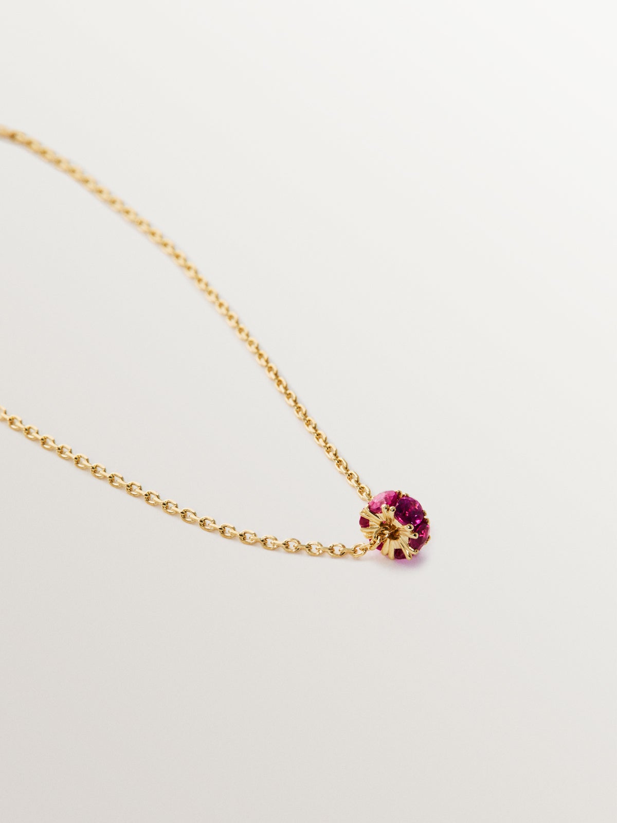 9K yellow gold pendant with rubies and diamonds