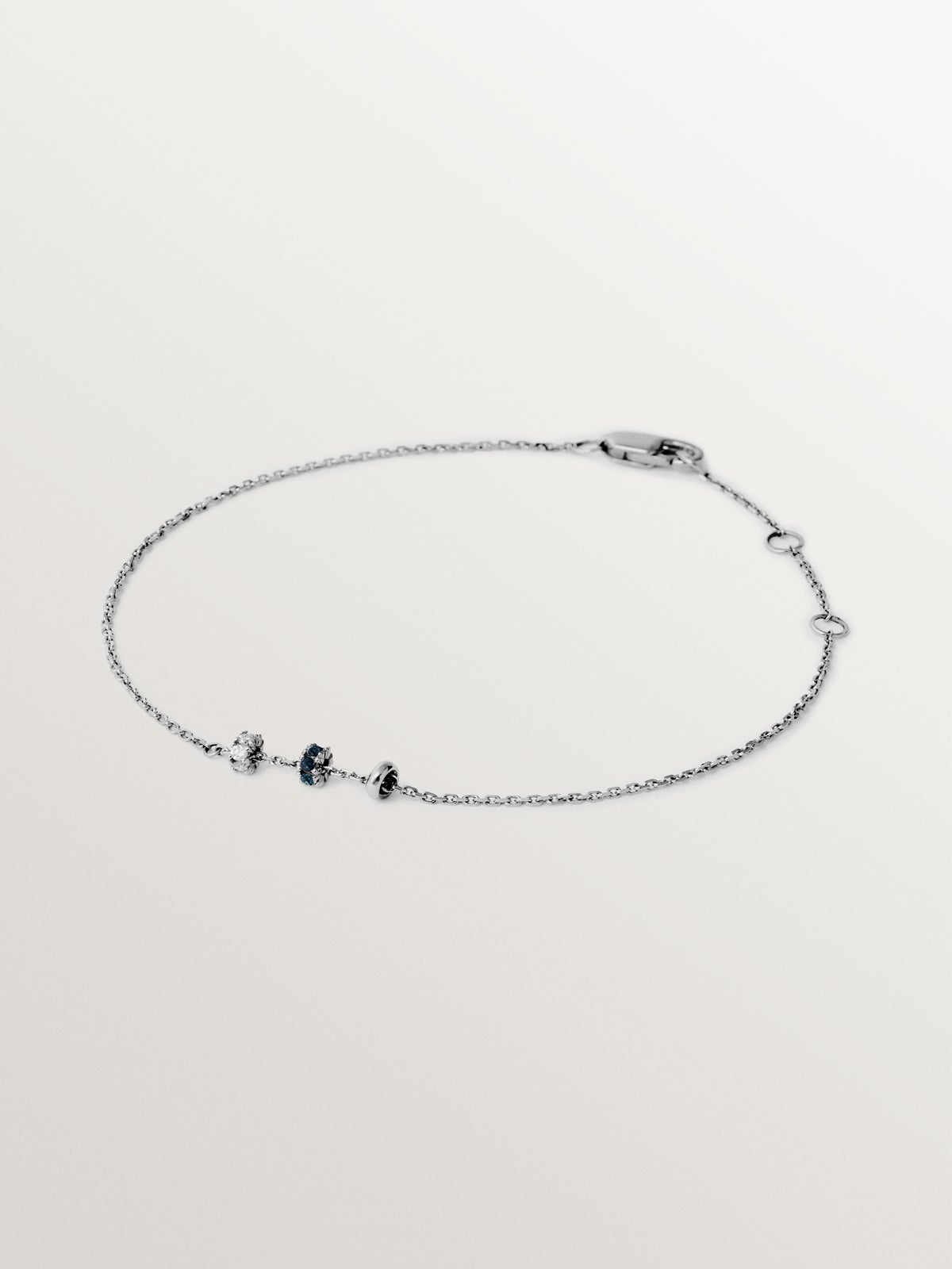 9K white gold bracelet with blue sapphires and diamonds